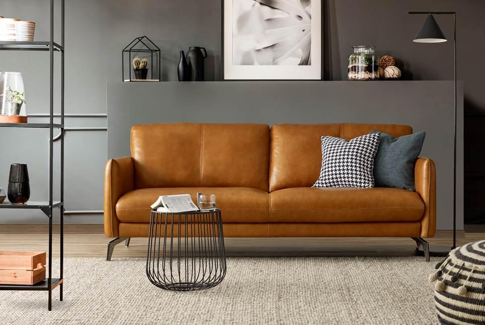 bobo chic interior design - full grain leather sofa